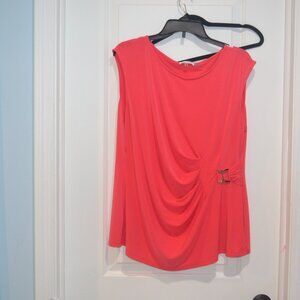 Pre owned Calvin Klein SleevlessTop Coral color with a gold tone buckle. Size XL